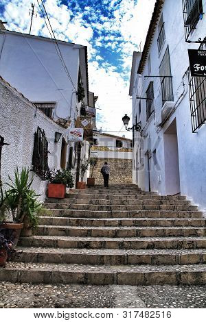 Altea, Alicante, Spain- September 19, 2018:narrow Streets And Beautiful White Facades In A Sunny Day