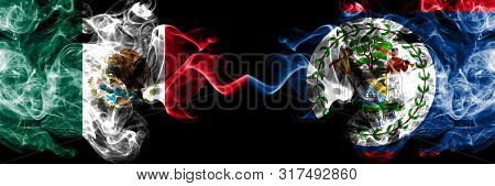 Mexico Vs Belize, Belizean Smoky Mystic Flags Placed Side By Side. Thick Colored Silky Abstract Smok