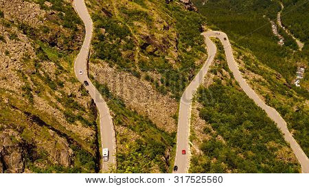 Trolls Path Trollstigen Winding Scenic Mountain Road With Many Cars, Norway Europe. National Tourist