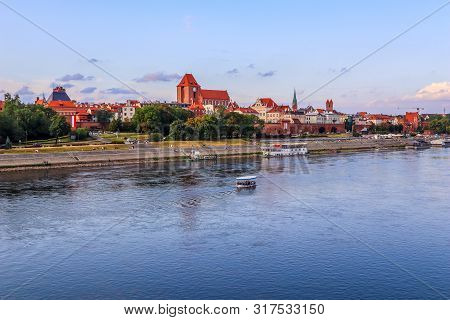 Panoramic View Of Torun City And Wisla (vistula) River At Sunset. Poland, Summer 2019