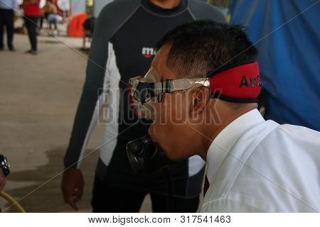 A Group Of People Doing Diving Training In A Swimming Pool In Batang / Central Java, Indonesia, Augu