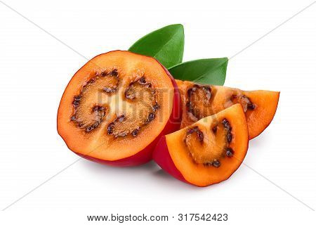 Fresh Tamarillo Half Fruit With Leaves Isolated On White Background