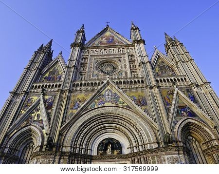 The Beautiful Cathedral Of Orvieto At Sunset