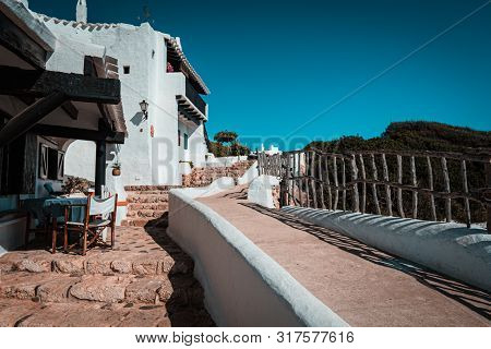 Traditional Fishing Village Of Binibeca On The Coast Of Menorca, Spain.