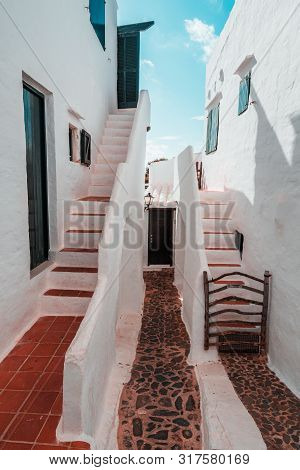 Traditional Fishing Village Of Binibeca On The Coast Of Menorca, Spain.