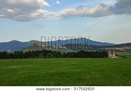 St. Martin's Cathedral At Spisska Kapitula With Spis Castle In The Background, Slovakia
