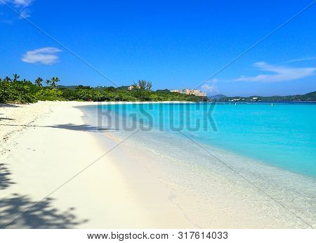 Beautiful Lindquist Beach Day On St. Thomas Us Virgin Islands With Clear Blue Skies, Palm Trees And 