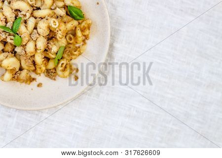 Traditional Soviet Russian Pasta Dish, Vermicelli, Navy Pasta, With Meat On A White Plate On A Light
