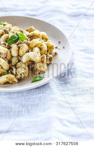 Traditional Soviet Russian Pasta Dish, Vermicelli, Navy Pasta, With Meat On A White Plate On A Light
