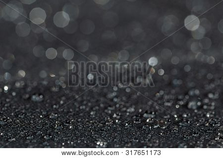 Dark Gray Waterproof Hydrophobic Flat Cloth Closeup With Rain Drops Selective Focus Background