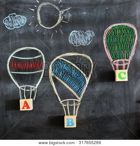 Back To School. Drawing Of Three Balloons Or Aerostats On A School Blackboard With The Letters Abc A