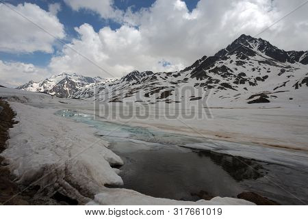 View From The Gavia Pass, An Alpine Pass Of The Southern Rhaetian Alps, Marking The Administrative B