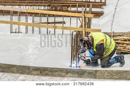 Welders In Welding Steel Bars. Process By Shielded Metal Arc Welding (smaw) .