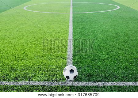 Soccer Ball On Artificial Turf For Green Background.