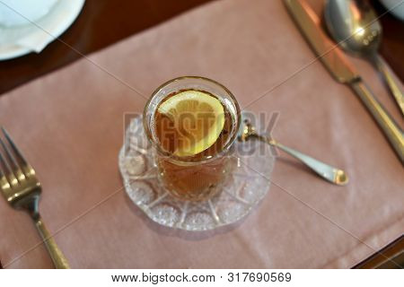 Armud Glass With Black Tea In Cafe