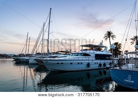 Denia, Spain - June 27, 2019: Luxury Yachts Moored In The Marina Of Denia At Sunset. Alicante, Spain