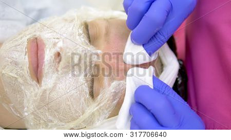Close-up. Face Of A Woman At A Beautician Appointment. Manual Facial Cleansing. Cleansing Facial Ski