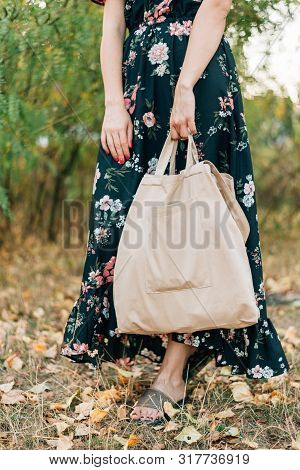 Caucasian Girl Holds Linen Shopper On Sunset Outdoors. Zero Waste Eco Friendly Conscious