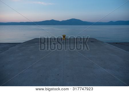 A Ships Allotted Place At A Wharf Or Dock. Quay For Boats, Ships, Liners. Coastal Zone. Twilight On 