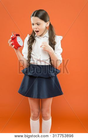 Girl Worry About Time. Children Education. Knowledge Day. Happy Girl Hold Alarm Clock Counting For L