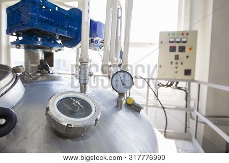 Belarus, The City Of Mensk, April 12, 2019. Chemical Production.metal Industrial Tank With Valve And