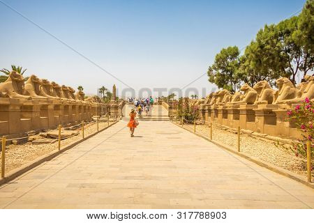 Avenue Of The Sphinxes With Tourists In Luxor, Egypt - April 16, 2019