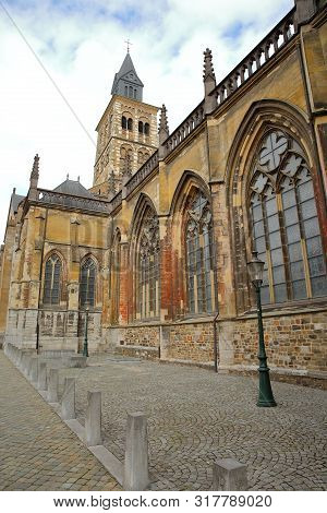 The External Southern Facade Of The Basilica Of Saint Servatius, 11th Century Cathedral, Vrijthof Sq