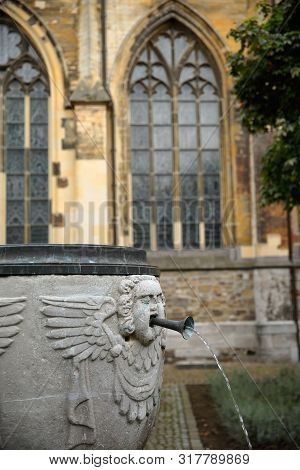 Maastricht, Netherlands - August 03, 2019: Close-up On A Fountain (ornated With Carvings) Located In