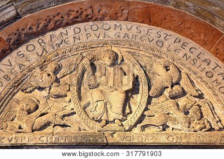 Maastricht, Netherlands - August 03, 2019: Carvings Representing The Christ (tympanum) Located Above