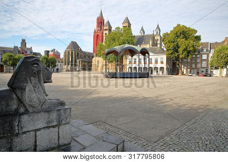 Vrijthof, With  The Basilica Of Saint Servatius And Sint Janskerk Church In The Background And A Scu