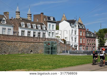 Historic Buildings Located Along Fortified Walls In Jekerkwartier, With The Basilica Of Our Lady In 