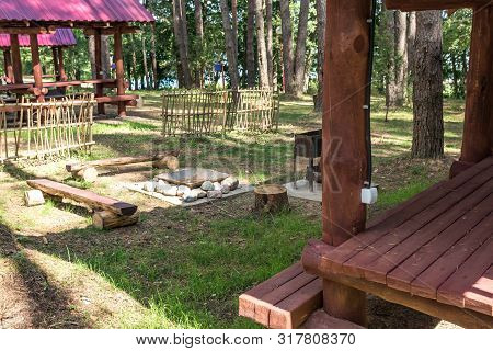 Wooden Camping Arbors  With All Conviniences In A Pine Forest