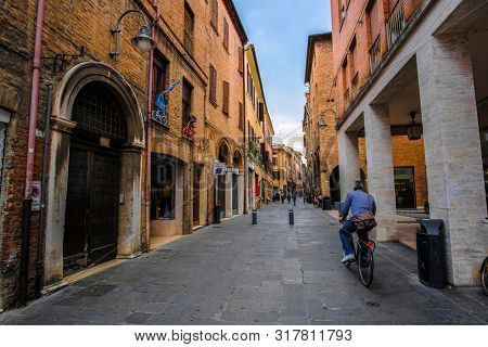 Ferrara, Italy - July,  , 2019: bycicle on a strett of Ferrara , Italy