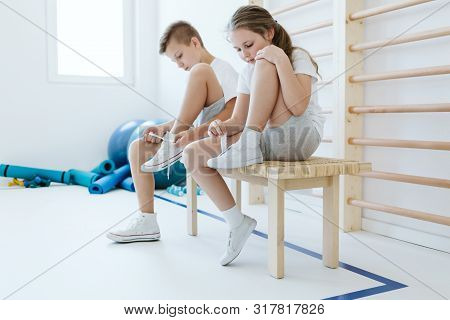 Boy And Girl At The Gym