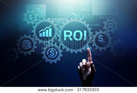Roi Return On Investment Reading Revenue Business Concept On Virtual Screen.