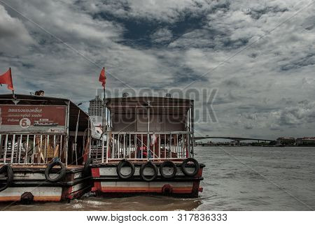 Bangkok, Thailand, 21 Jul 2019: View Of The Chao Phraya Express Boat And Krung Thep Bridge In The Ba