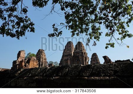 Stone Towers Of A Medieval Khmer Temple. Baray East Mebon.