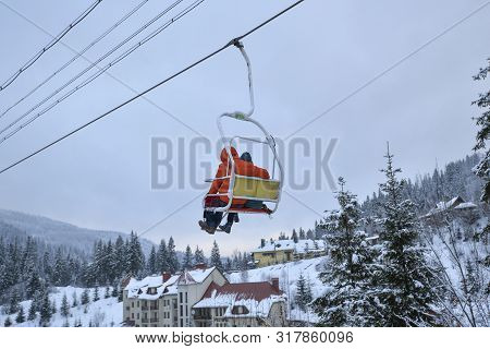 Slavske, Ukraine - December 26, 2019: People Are Lifting On Ski-lift In The Carpathians Mountains