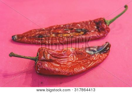 Roasted Red Peppers On Table