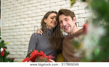 Happy Caucasian Couple Celebrate Early Christmas Morning