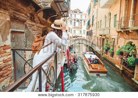 Woman Looking At Canal With Gandola Summer Vacation