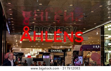 Stockholm, Sweden - April 20, 2019: The Red Logo Above The Entrance To Ahlens Shopping Mall And Stor
