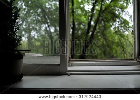Nostalgic Concept, Opened Window In Cozy Walm Home While It Rains Outdoor