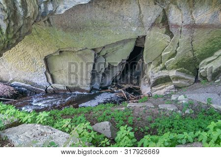 Han-sur-lesse, Belgium - June 25, 2019: Grottes De Han. Spot Where Lesse River Enters The Cave Syste