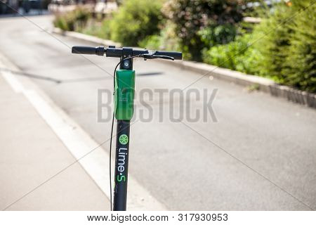 Lyon, France - July 13, 2019: Lime Logo On One Pf Their Electric Scooters In Lyon. Lime Is A Transpo