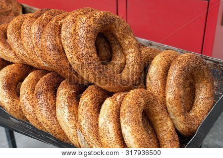 Circular Sesame Bread Turkish Style Called As Simit On Street Food Shop In Turkish. Round Sesame Bre