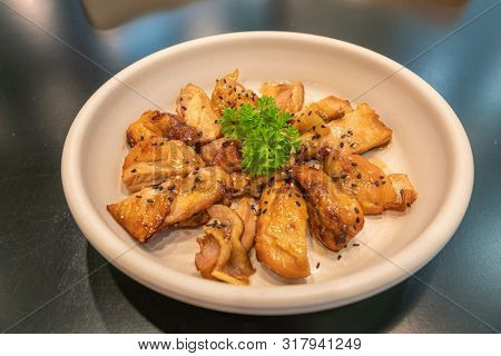 Korean Fried Chicken With Soy Sauce Decorated With Parsley