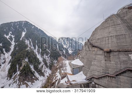 Scene Of Kurobe Dam Between Snow Wall At Tateyama Kurobe Alpine Route, Japan