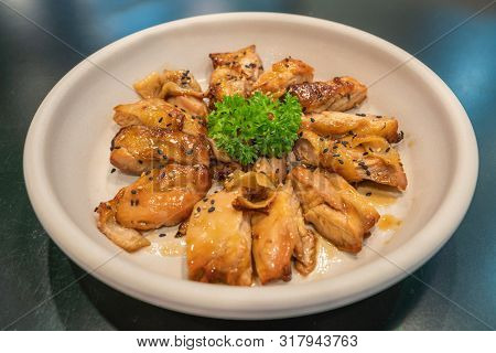Delicious And Well-decorated Dish Of Grilled Chicken In Korean Style