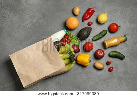 Paper Bag With Groceries On Grey Background, Flat Lay